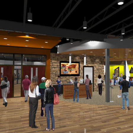 Church Renovation, Master planning, Children secure check-in, medium size church, Mountain West Architects, pendant lighting in churches, canned lighting in churches, stone interior walls in church buildings, exposed roof trusses in church buildings, dropped ceilings in church foyer, modern church foyer, irregular church windows, accessible kids area in churches
