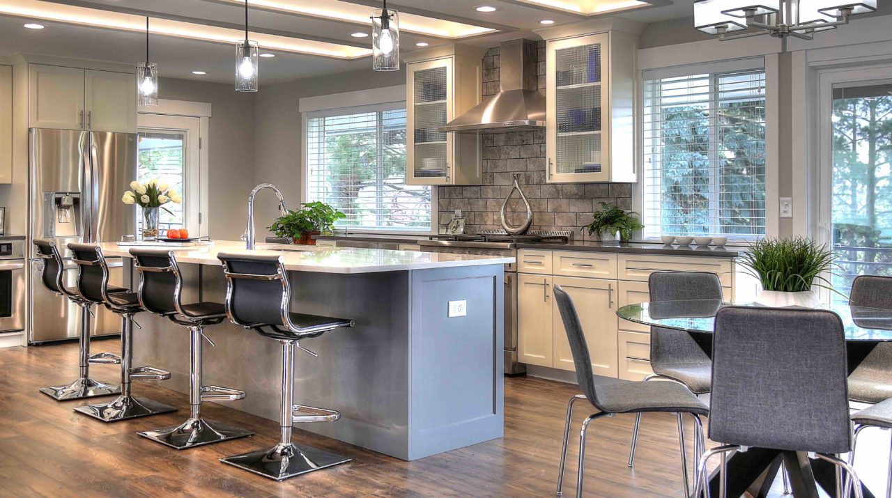 Ogden Contemporary Residential renovation, custom cabinetry, coffer ceiling, large kitchen island, white cabinetry, gray cabinetry, open concept, tile fireplace, bay window