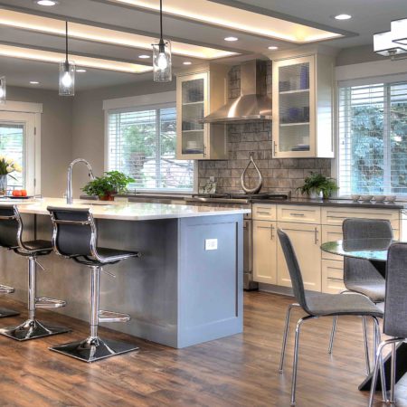 Ogden Contemporary Residential renovation, custom cabinetry, coffer ceiling, large kitchen island, white cabinetry, gray cabinetry, open concept, tile fireplace, bay window