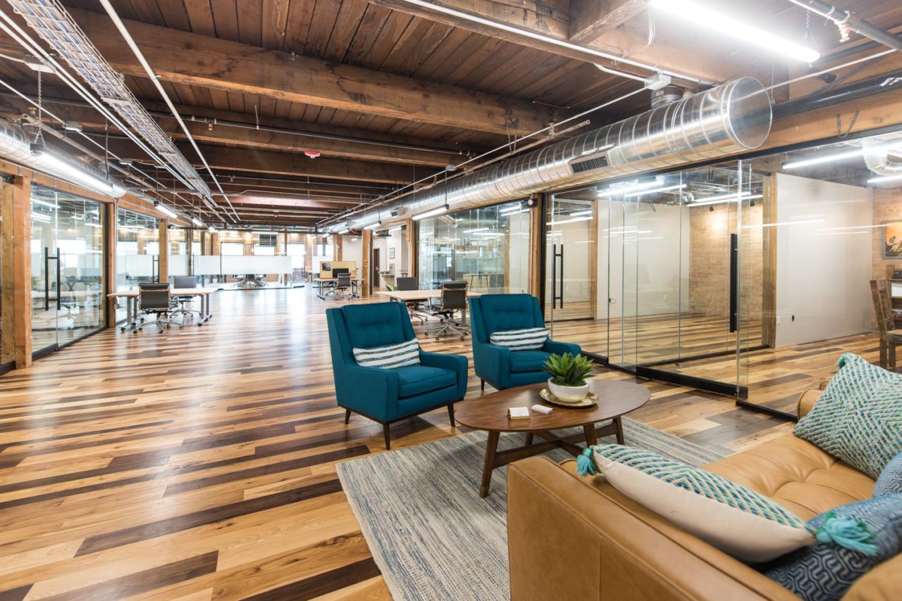 Renovated office. Glass partition walls. Family Business Center. Urban industrial design.