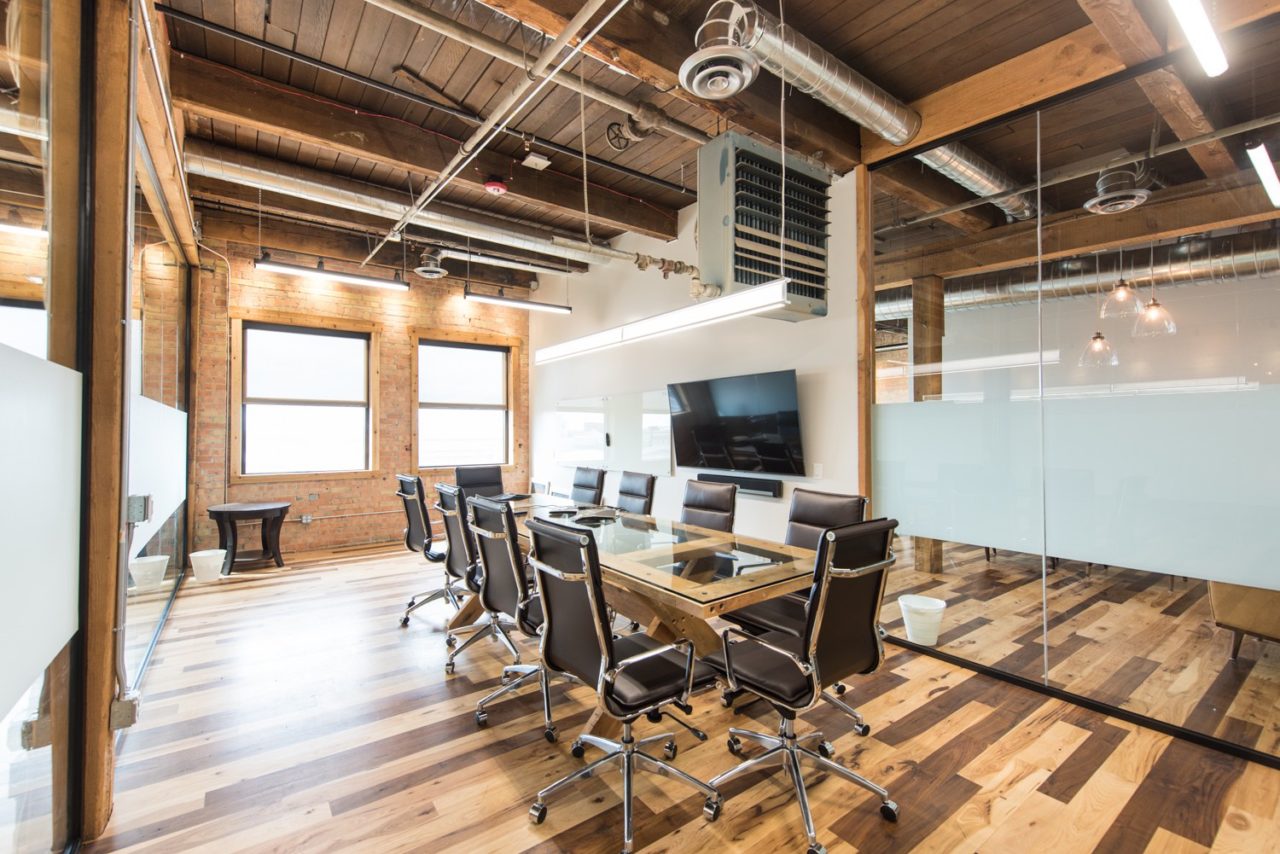 Renovated office. Glass partition walls. Family Business Center. Urban industrial design.