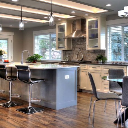 remodeled kitchens, pendant lights for kitchens, stone backsplash, modern seating in kitchen, marble countertops, flush mount lighting, kitchen skylights