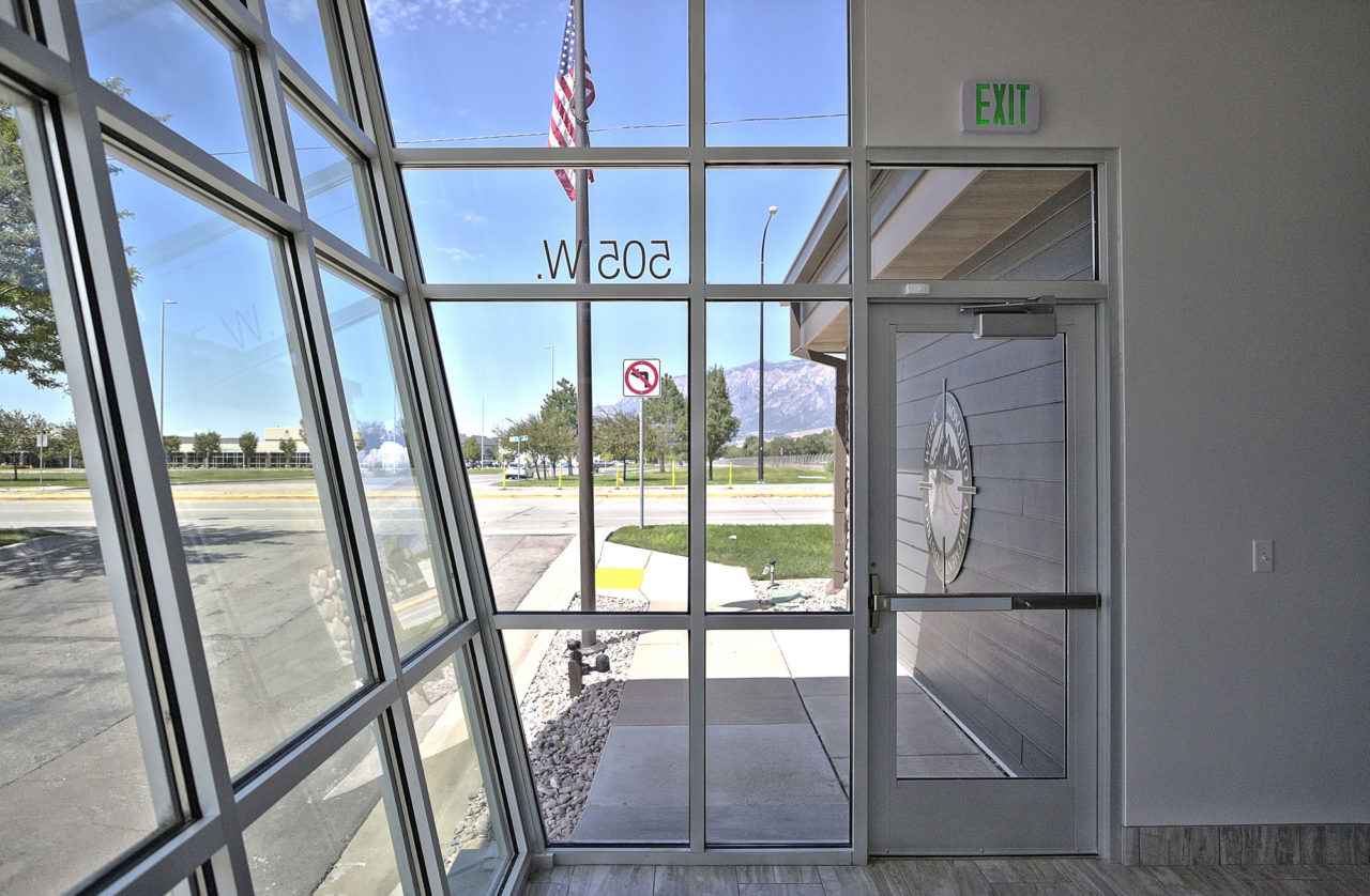 aluminum storefront windows, diagnol storefront entrance, abstract storefront entrance, unique storefront entrance